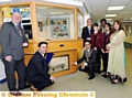 Pictured (from left, school historian and teacher Mike Russell with Andy Potts, head of humanities; the Mayor, Cllr Ateeque ur-Rehman; school principal Dave McEntee; Adam Anderton, Tomi Akingbehin, Maisha Rahman and the mayoress Yasmin Toor).