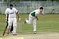 STUDY IN CONCENTRATION . . . Glodwick’s Mark Whitehead sends a delivery during his team’s T20 victory over Whalley Range. 
