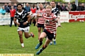 MARAUDER: Game star George Tyson hurtles forward in possession.