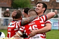 WELL DONE, LADS: Oldham men Steve Roper (left), Kenny Hughes and Lewis Palfrey celebrate a comprehensive victory. 
