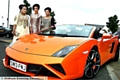 STYLISH (l-r): Jazin Khatun, Alisha Mahmood and Bushra Gul pose with a Lamborghini