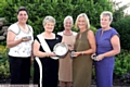 ALL SMILES . . . at Marjorie’s lady-captain’s day at Crompton and Royton. From left: Zoe Styles (best back nine), Marjorie Bray, Joyce Adams (runner-up), Andrea Lowe (winner) and Jennifer Kenworthy (best front nine).