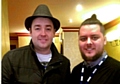 Travis's radio career has allowed him to meet stars such as comedian Jason Manford (left)