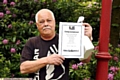 Keith with his prize certificate - all he’s taking from his win