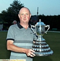 
WINNER . . . Darren Griffiths with the trophy in 2013