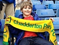 Jude with his Chadderton Park FC scarf watches Chelsea play at Stamford Bridge