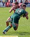 HIT MAN ... dual-reg player Jacob Fairbank puts in a crunching tackle for Oldham