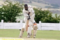 STRAIGHT BAT: Alton Beckford defends on the way to a fine knock of 116 for Micklehurst against Saddleworth.