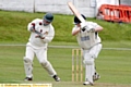 JUGGLING ACT: Royton skipper Denny Hulme, who later went on to play a starring role with the bat, holds on to the ball as Rochdale batsman Tom Avery misses. 