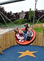 CHILDREN try out the new play area dedicated to Jamie.