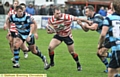 NEW LEASE OF LIFE: Prop forward Adam Neal (centre) is enjoying his return to rugby league with Oldham.