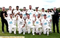 WHAT A FEELING: Saddleworth’s players celebrate alongside joint team manager Peter Gill (left) and scorer Paul Seddon. 