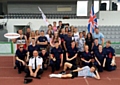 Lukasz Krause (back left, pink shirt) with other cadets from the North-West at the 20th international meeting of Youth Fire Brigades.
