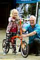 ON HER BIKE: Darcie Marsland (6) with Wayne O'Connor, cycle officer for TfGM.