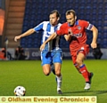 RUNNING GAME . . . Athletic skipper Liam Kelly (right) tries to get ahead of his Colchester opponent in last night’s game. 
