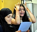 An elated Sharmin Ahmed and her equally-successful friend Humayra Begum gets their results at The Radclyffe School