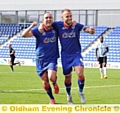 WELL DONE, MATE . . . Lee Croft (left) congratulates success