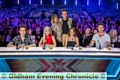 Nick, left co-stars Rita Ora, Cheryl Fernandez-Versini and Simon Cowell. Behind them are show presenters Caroline Flack and Olly Murs.