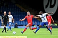 RUNNING BATTLE . . . David Dunn shows power to go alongside his finesse during this midfield duel.