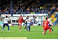 New loan signing Simonas Stankevicius tries his luck as Athletic press for a winner against Bury on Saturday. 