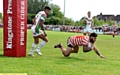 SAFELY OVER . . . Sammy Gee scores Oldham’s opening try.