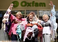 UPLIFTING DONATION: Anne Watson (centre), volunteer deputy manager of Oxfam, is delighted with the generous donation. With her are Vicky Lees (l) and Marjorie Bamforth from Oldham Inner Wheel. 