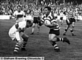 A rampaging Derek Turner in action against Workington in 1958.