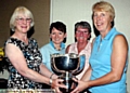 Winning team: (from left) Jenny Knight, Chair of Oldham ladies golf assocation, Jill Nolin, Anne Rotchell, Chris Peirson. Photo Paul Sterritt