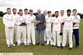 TITLE TRIUMPH: Saddleworth captain Brian Lord receives the Hollingworth Challenge Trophy from Eddie Bayliss, chairman of the SWB Commercials Saddleworth and District Cricket League. 