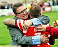 Oldham chairman embraces Steve Roper at the final hooter.