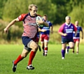 POINTS MACHINE . . . Oldham’s Callum Megram turns on the turbo during his superb display against Hawcoat.