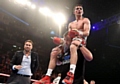 THAT’S MY BOY . . . Joe Gallagher hoists Anthony Crollla on to his shoulders after the last Perez fight.