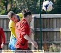 heads I win: Royton Town’s Tom Hughes directs an attempt at the AFC Monton goal.
John Gilder