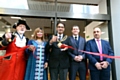 Mayor Councillor Ateeque Ur-Rehman cuts the ribbon to open the new TJ Hughes store, with (from left) Clitheroe town crier Roland Hailwood, Mayoress Councillor Yasmin Toor, Jason Harmer, head of
