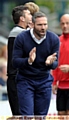 ANIMATED . . . David Dunn gets involved on the touchline