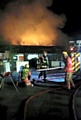 FIREFIGHTERS tackle the blaze at Oldham Sofa Company