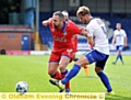 STILL GOING STRONG . . . Athletic’s David Dunn displays his skills against Bury.