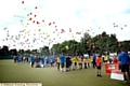 COLOURFUL start . . . balloons are launched as part of the opening ceremony. 