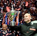 TOP CLASS: Stuart Bingham celebrates with the trophy after winning the Betfred World Championship final at the Crucible Theatre.