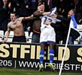 YOU'RE THE MAN . . . Freddie Ladapo is mobbed by fans after equalising for Athletic
