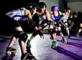 THE Rainy City Roller Derby players in action