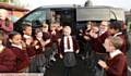 Ss Aidan and Oswald pupil Louise Goulden arrives at school in luxury and is greeted by her friends.