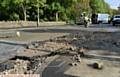 Damage caused by burst water main on Manchester Road, Greenfield at the junction with Dacres Road.