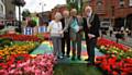 LOOK how we've grown . . . Oldham Mayor and Mayoress Derek Heffernan with judges (centre) Brian Whalley and Malcolm Ewbank
