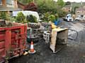 A 60-year-old man was trapped underneath the digger in Primrose Avenue, Uppermill