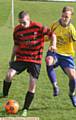 HOLD IT THERE . . . Oddies' Nathan Dawson guards the ball as Athletic's Jamie Clark closes in