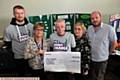 BERNARD Exton presents a cheque for £2,755 to Macmillan after he and Todd Bowers (left) had their heads shaved. Also pictured are Donna Dawson and Jade Hughes (Macmillan 1 to 1) and Steve Lawton (Macmillan benefits advisor)