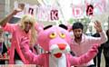 Pink Day at Oldham Sixth Form College. (l-r) Ibrahim Chishti, Pink Panther and Tameem Rahman