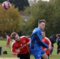 HEADS UP . . . an aerial confrontation sees Daniel Coleman (left) , of North Star, try to win a header