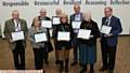 Elizabeth Scoltock,, school governor at St Hida's school, Oldham, with 30 years service, Lesley Hampson, governor at North Chadderton school, with 24 years service, Marlene Armitage, governor at Holy Cross church of England primary,Oldham, with 42 years service. L/R, (back row), Alan Armitage, governor at St Hilda's CE primary school,Oldham, with 18 years service, Eddie Moore